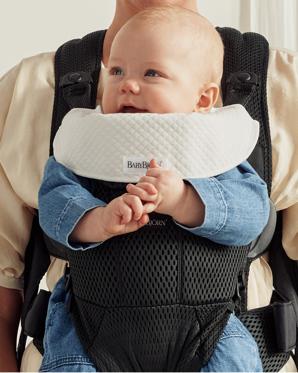 2 bavoirs porte-bébé Move et Mini Coloris blanc Babybjörn