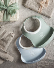 Lot de 2 bavoirs récupérateurs Coloris vert pastel/bleu pastel Babybjörn
