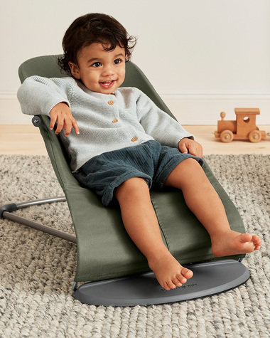 Transat Bliss tiss&eacute; matelassage p&eacute;tale Coloris vert fonc&eacute;  Babybj&ouml;rn